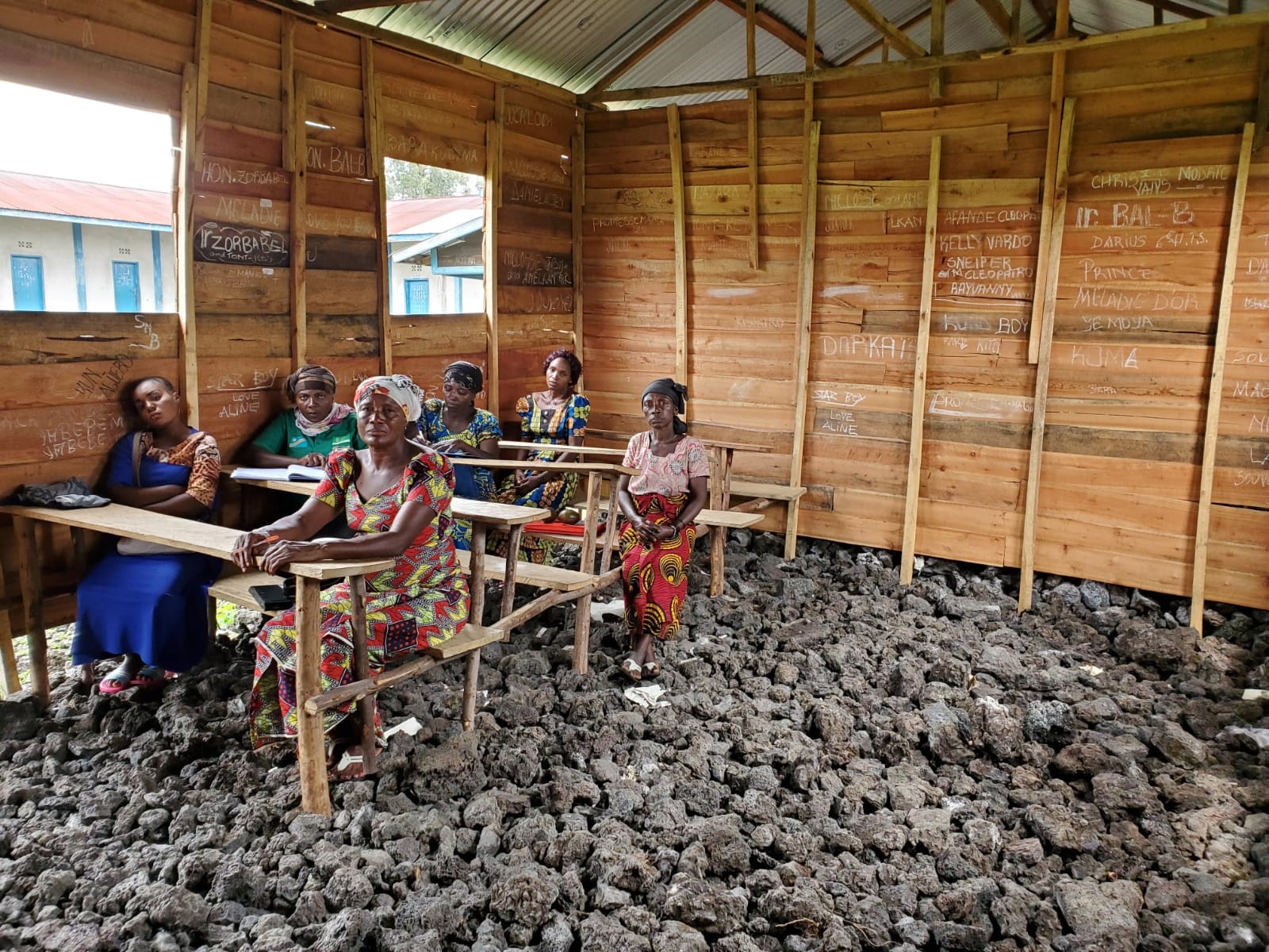 Training a group of volunteer community health workers in an empty school in Goma.