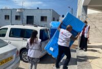 An MSF staff carrying emergency and trauma medical supplies in the Jenin refugee camp.