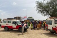 MSF trucks at a refugee camp in Chad.