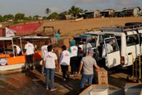 MSF Team members loading medical supplies on motor boats in Delta Amacuro state, north eastern Venezuela.