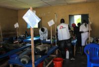 Medical teams taking care of patients suspected with cholera in the cholera treatment center.