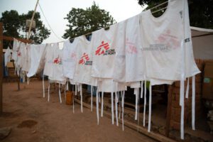 MSF staff vests hanging out at the site of the emergency measles vaccination team in Baboua.