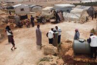 MSF staff carrying out WASH Assessment in Idlib Camps.