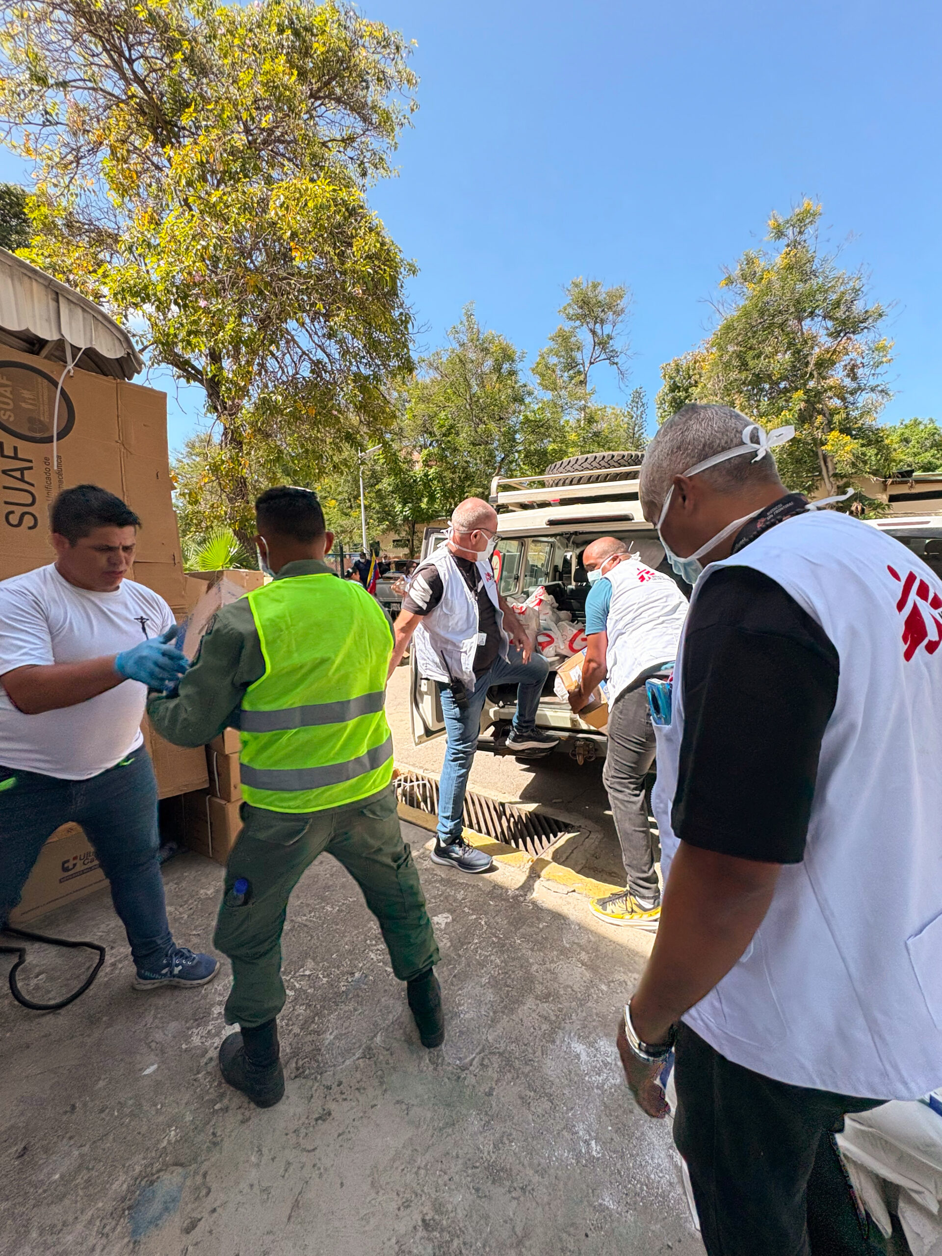 MSF staff members load box full of supplies into a van as part of an emergency response, following earthquakes in Venezuela. Venezuela, 2026.